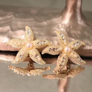 Starfish pearl clip on earrings